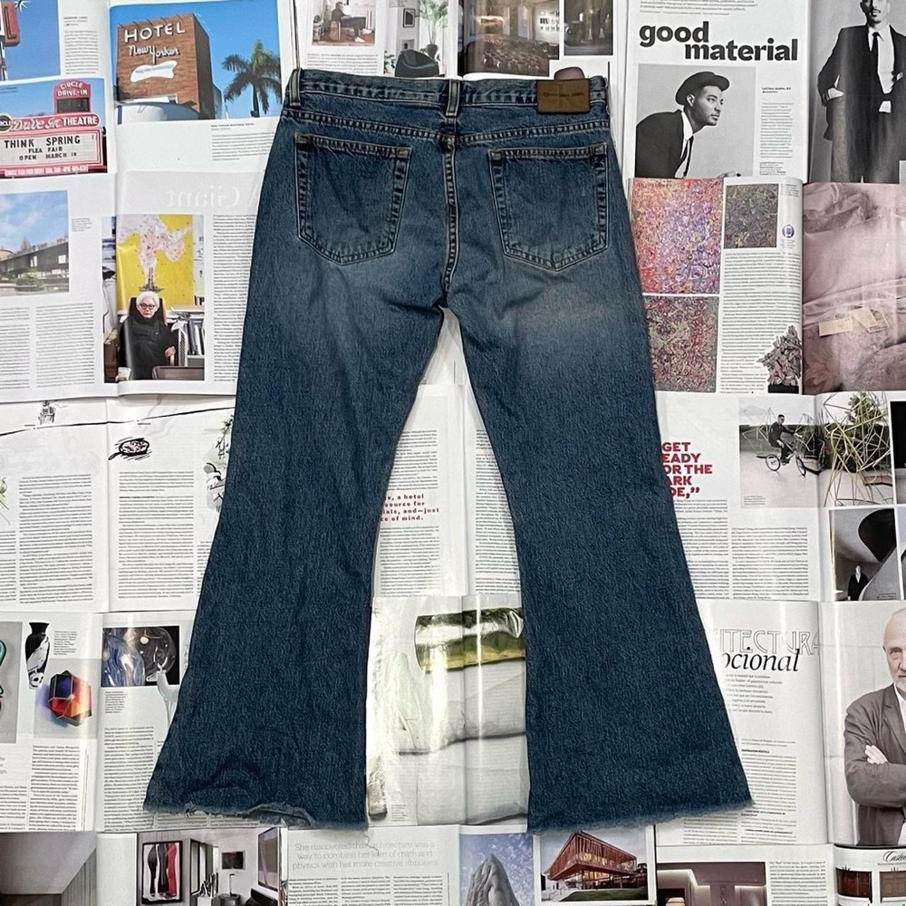 Calvin Klein medium wash mid-rise flare jeans size 30